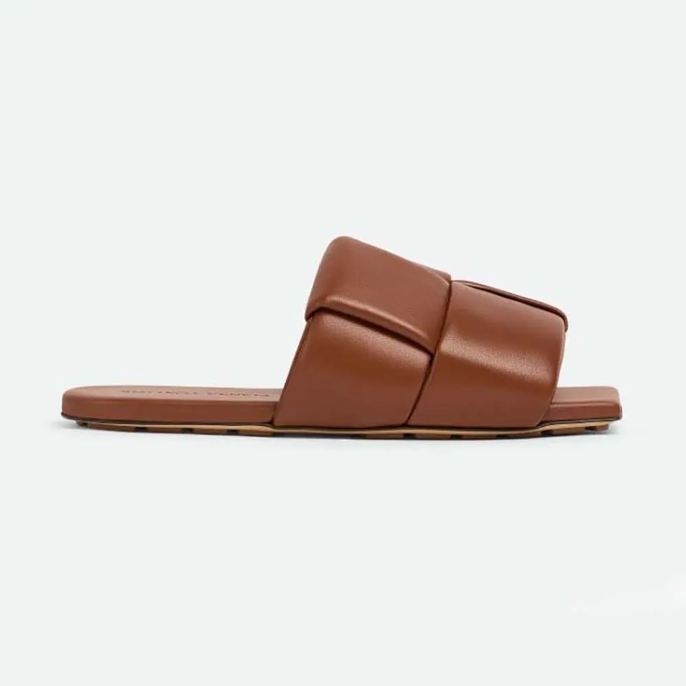 Bottega Veneta Mules planos con parche para mujer Mules planos de piel Intreccio acolchados-Marrón