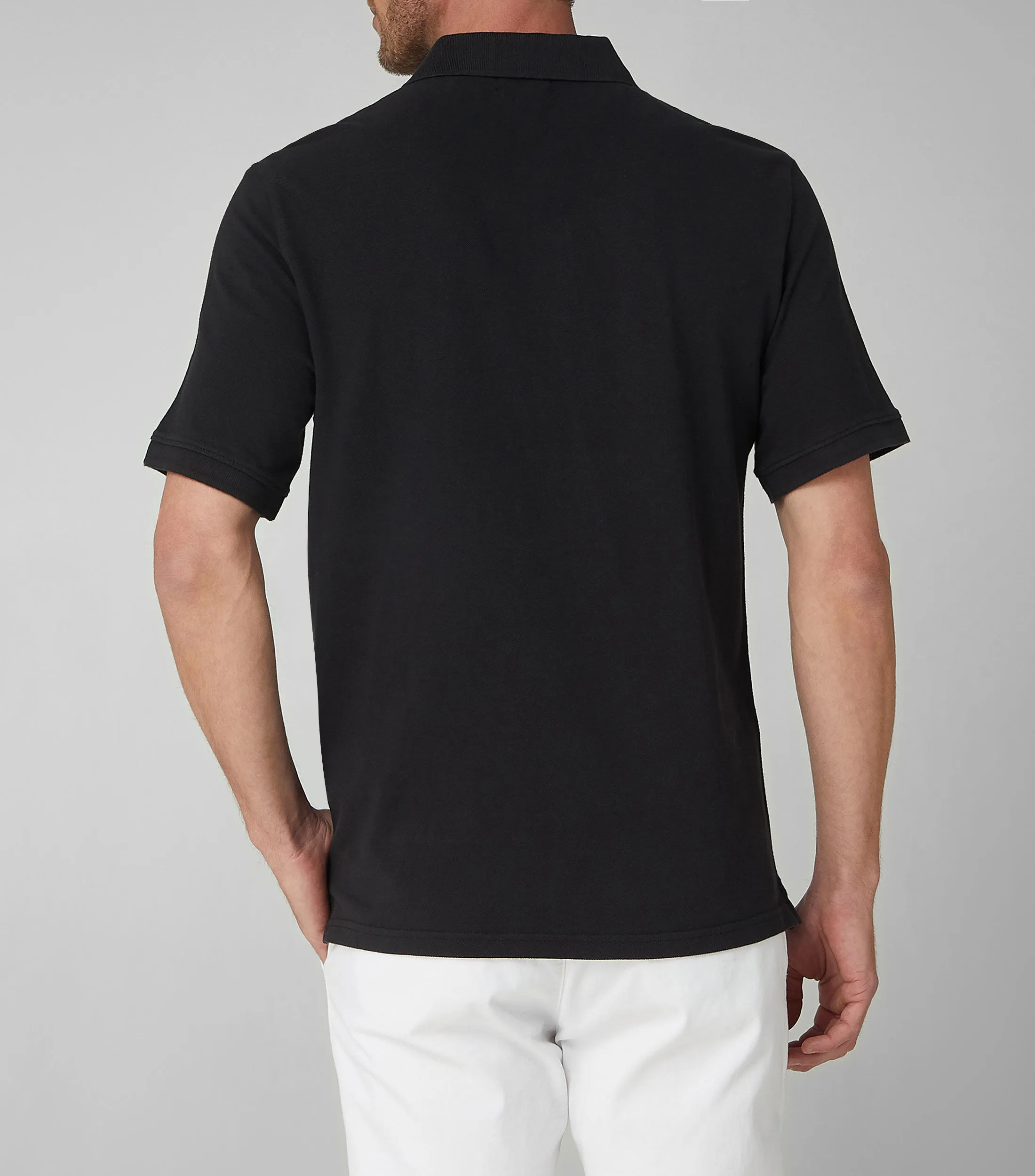 Dockers Playera tipo Polo negra con manga corta Hombre