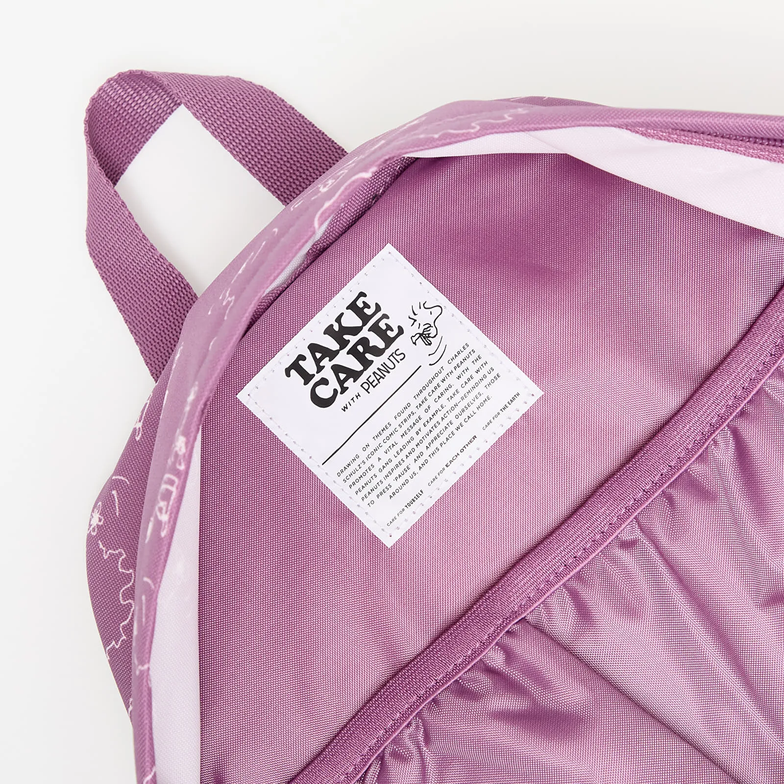 EASTPAK x Peanuts Padded Pak'R