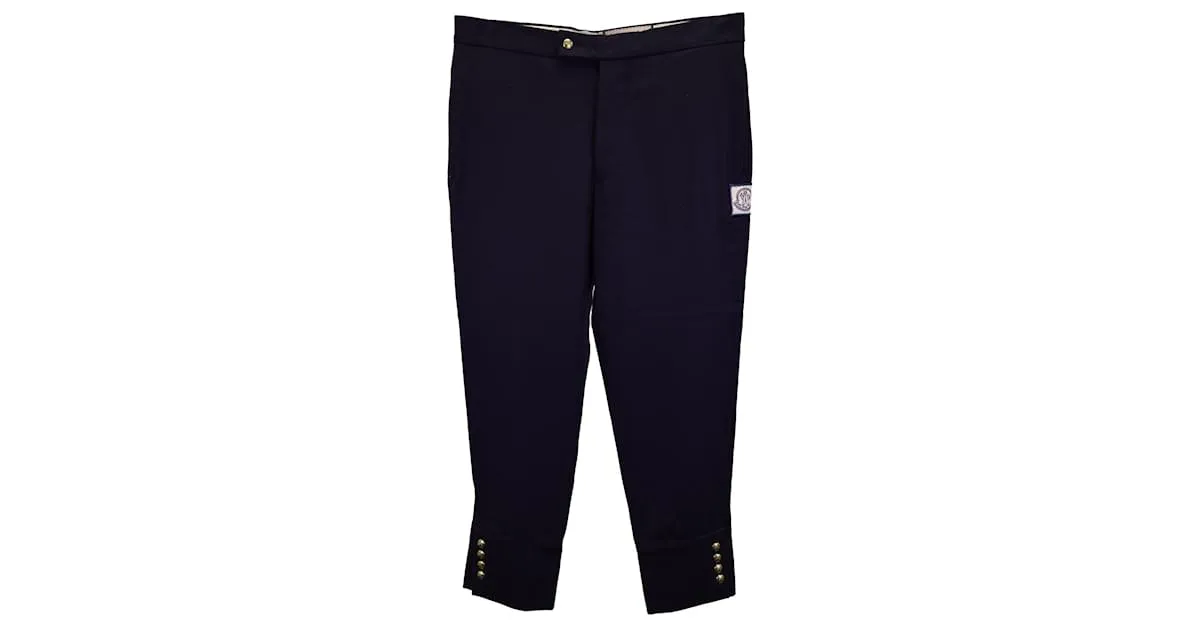 Pantalón Moncler con botones a presión dorados en lana azul marino 