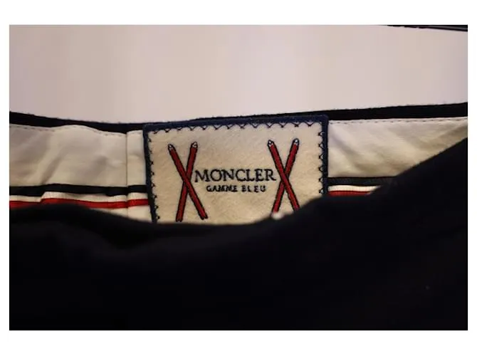 Pantalón Moncler con botones a presión dorados en lana azul marino 